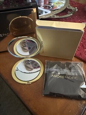 Amore Pacific Gold Compact Mirror with Black Pouch